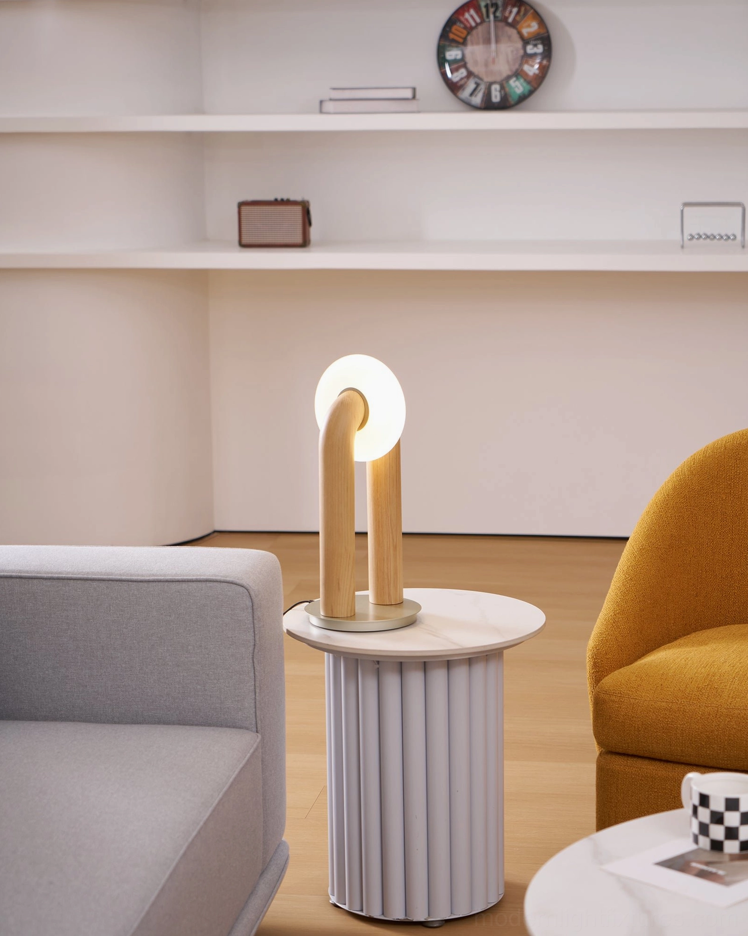 Teelo table lamp with white frosted shade creating non-glare ambient illumination in bedroom setting