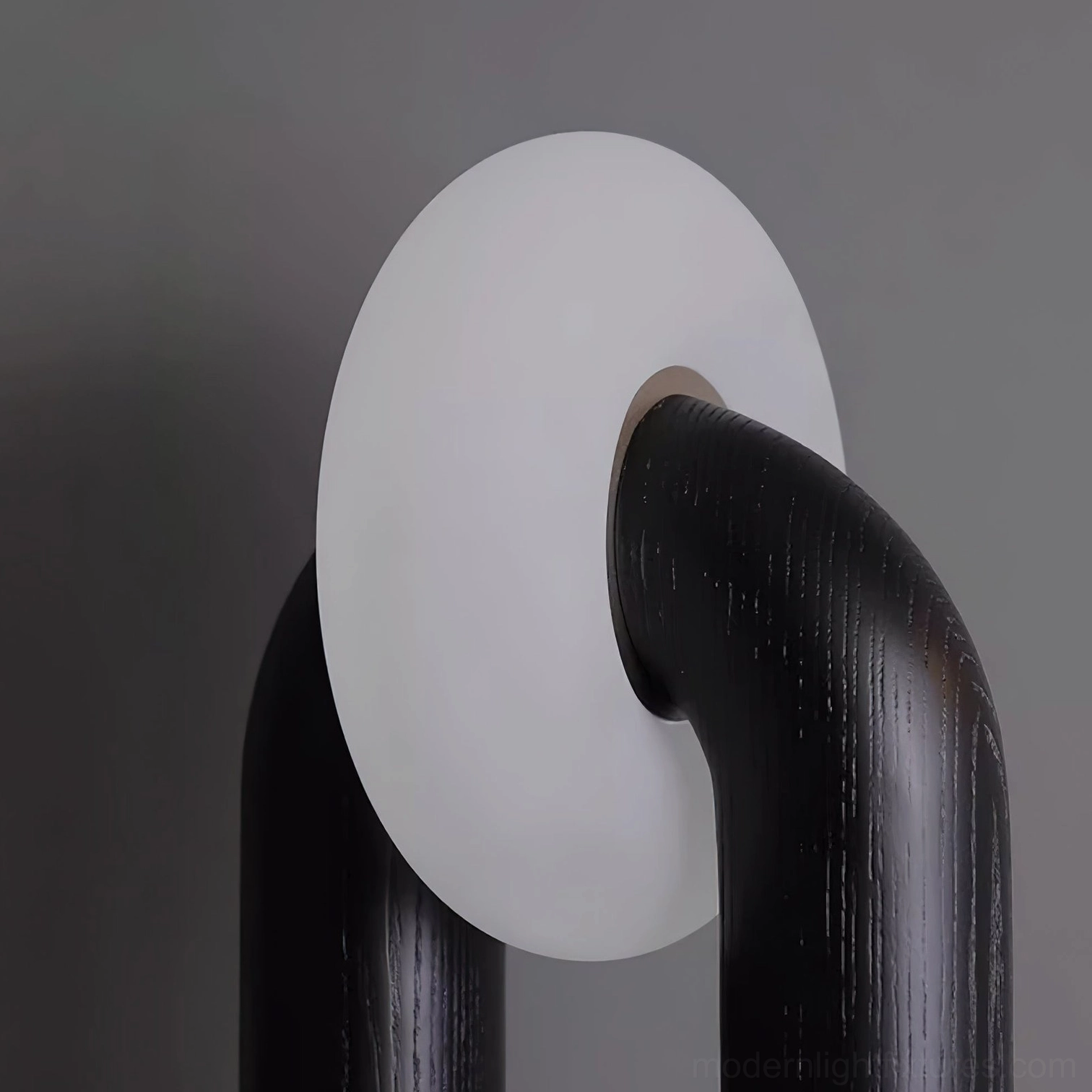 Teelo wood base table lamp with integrated LED showing soft diffused light through frosted acrylic shade