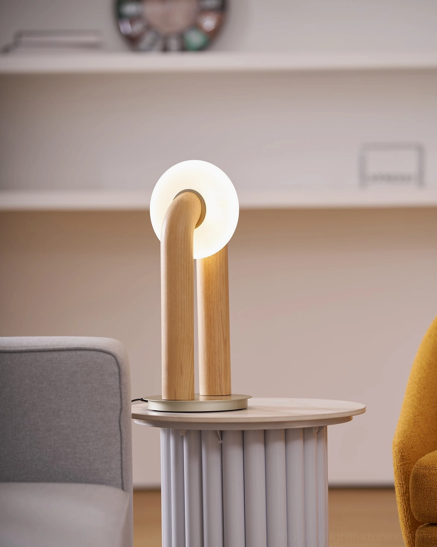 Teelo minimalist lamp design showing organic curved wooden body and spherical frosted shade proportions