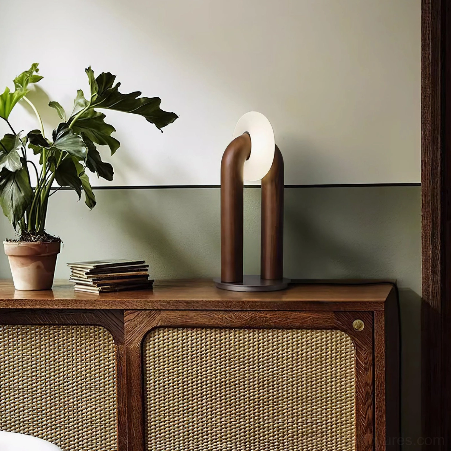 White finish Teelo table lamp on modern nightstand creating warm 3000K ambient lighting
