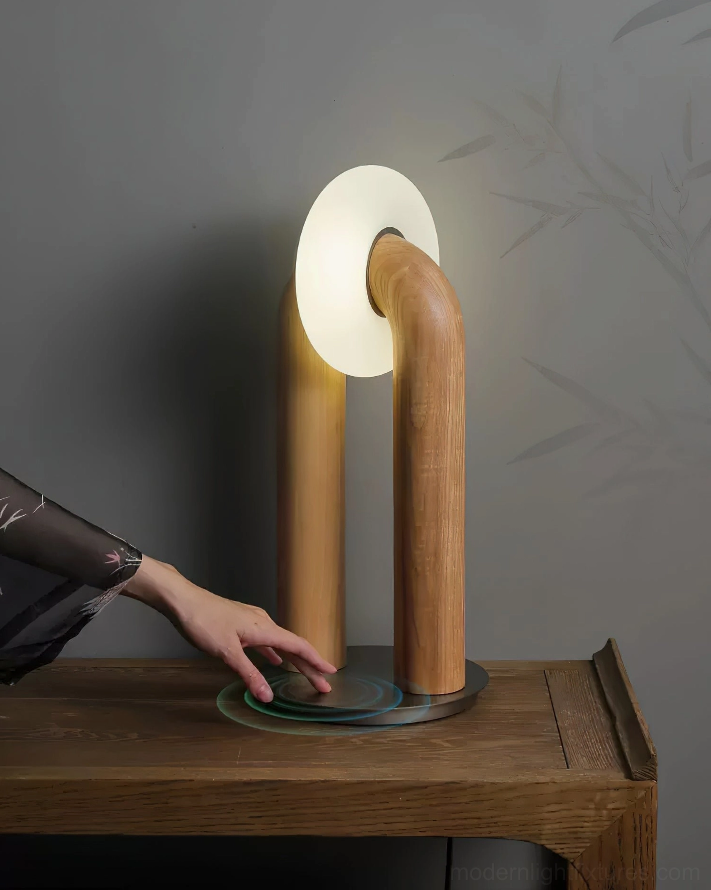 Natural wood Teelo table lamp with touch control circular base, hand adjusting smooth wooden body