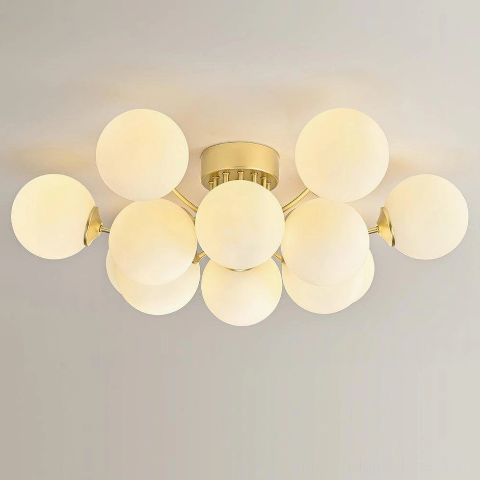 10-head sputnik ceiling light flat-on view with brass gold metal branches and frosted glass ball shades