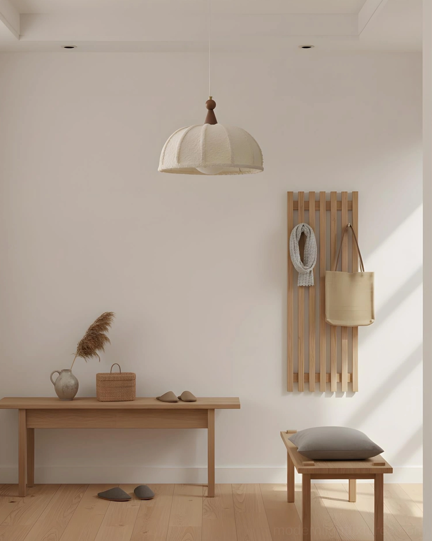Tenera pendant lamp in minimalist entryway with wooden wall hooks and bench seating