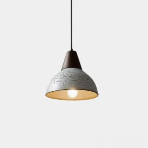 Tera ceramic pendant light with textured off-white shade and walnut wood fixture, frontal close-up view showing artisan craftsmanship and wabi-sabi design