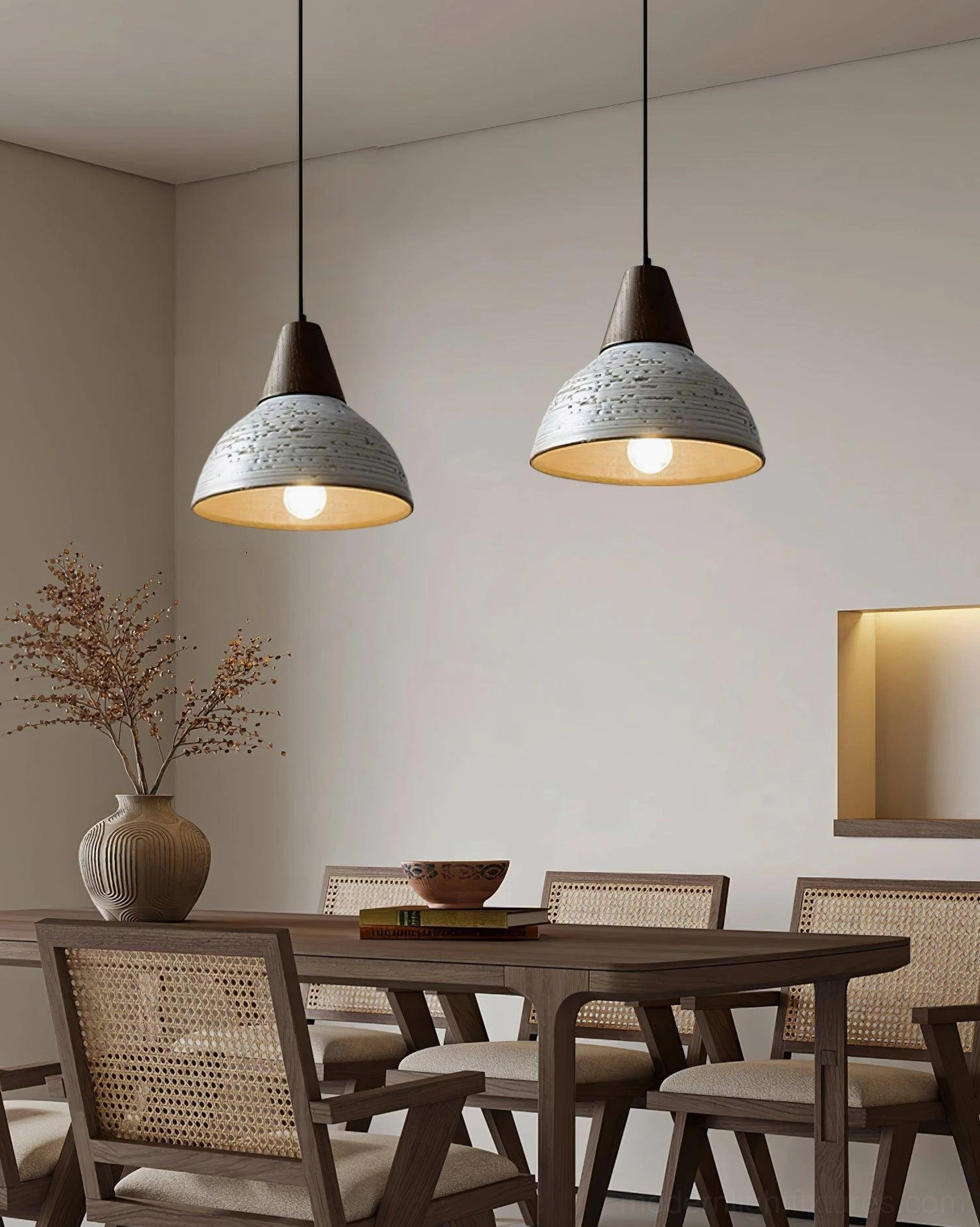 Dual Tera pendant lamps in formal dining room setting with wooden table and woven dining chairs, warm ambient home décor lighting