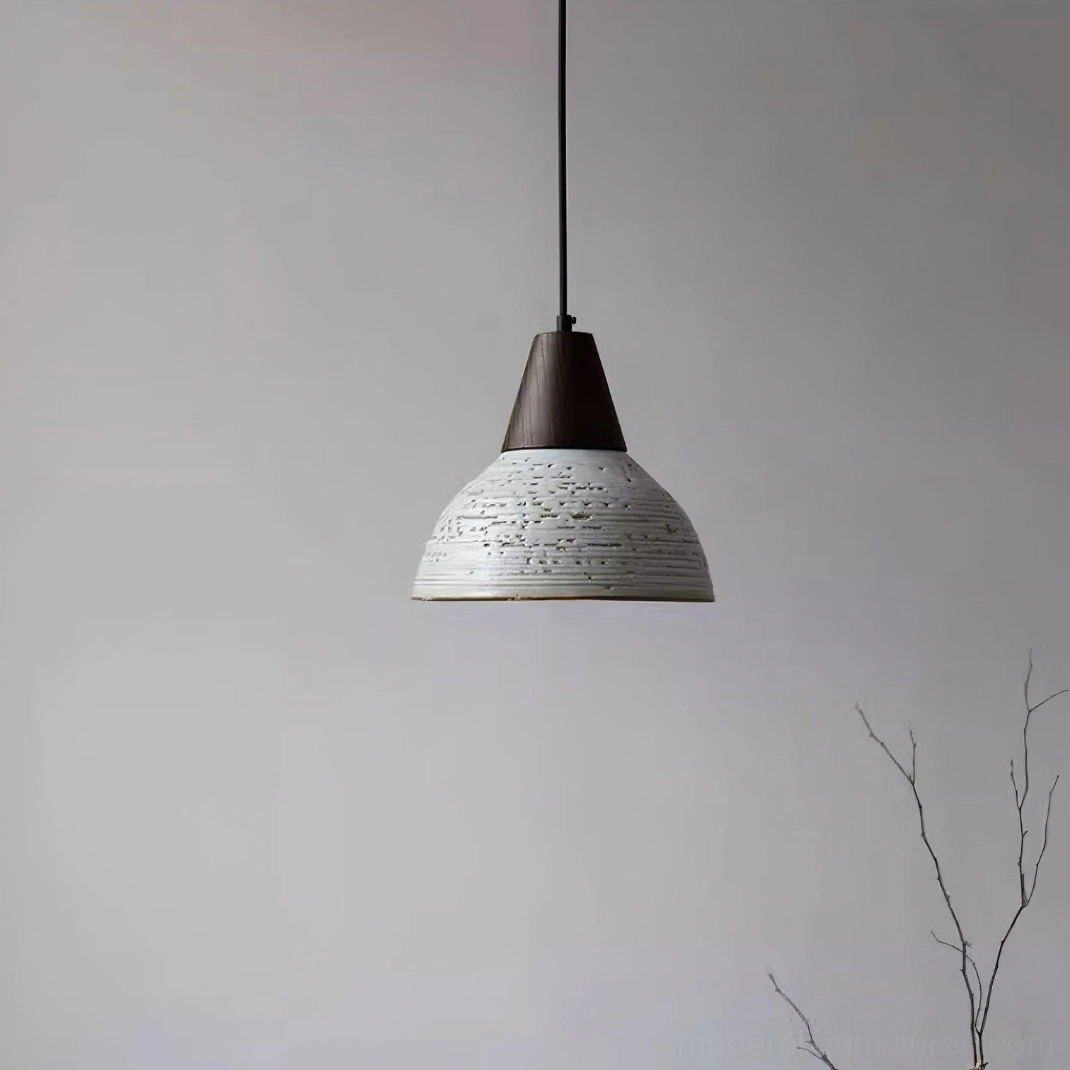Tera pendant light suspended installation showing adjustable 150cm wire length and sloped ceiling compatibility for flexible placement