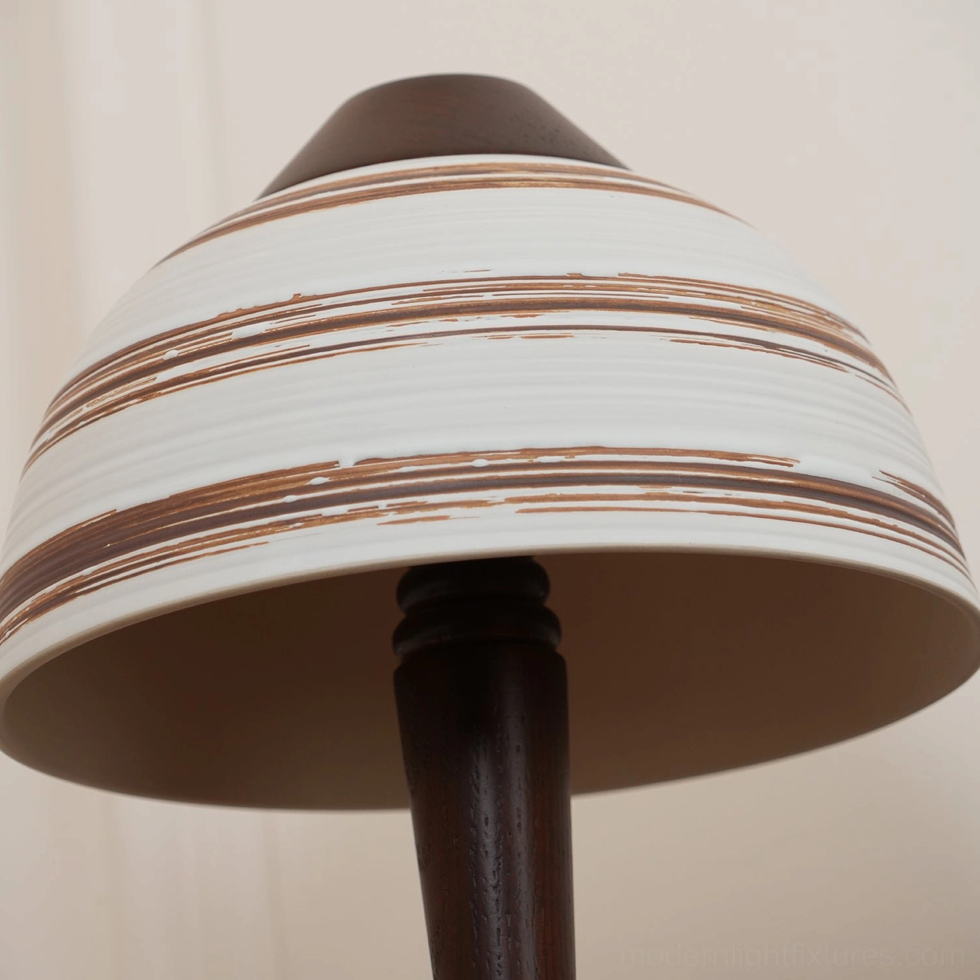 Tera table lamp walnut wood construction showing craftsmanship and ceramic hand-applied accents