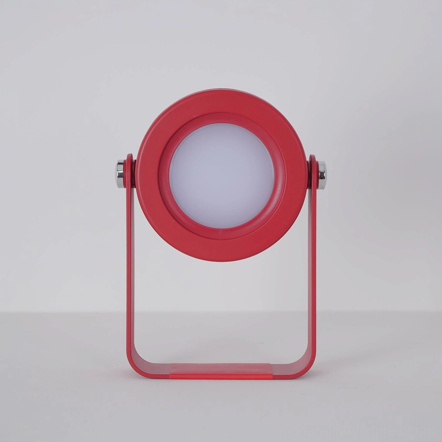 Terna Portable Table Lamp - Metal hinge mechanism and accordion shade construction detail showing durability and engineering