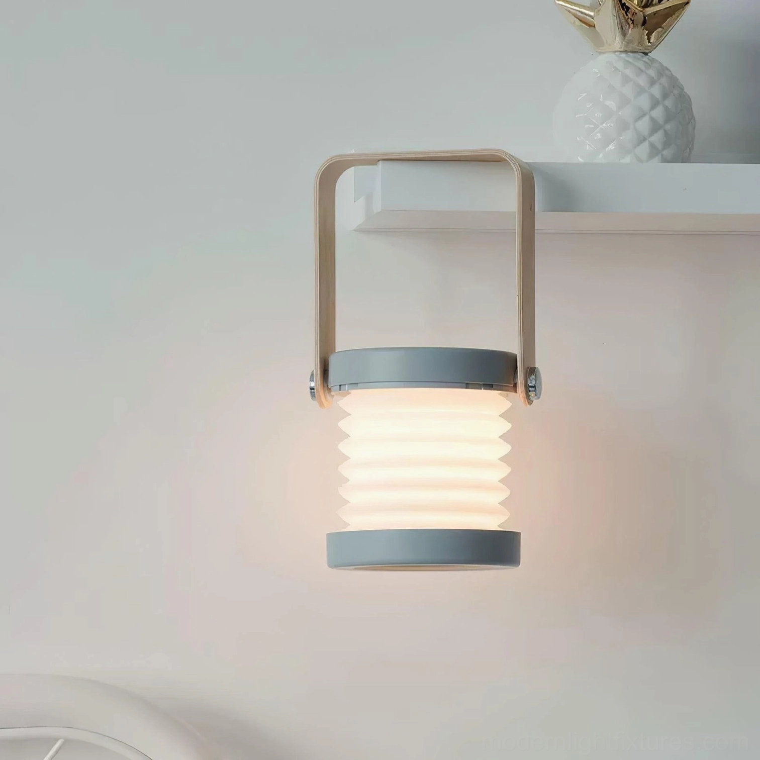 Terna Portable Table Lamp - Transformation sequence showing conversion from table lamp to portable lantern form