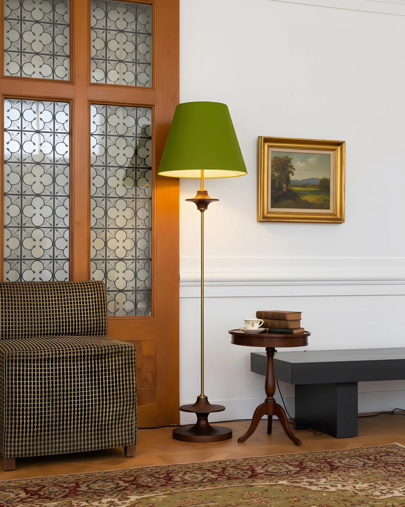 Terrava sculptural floor lamp with green shade illuminated in contemporary living room ambiance