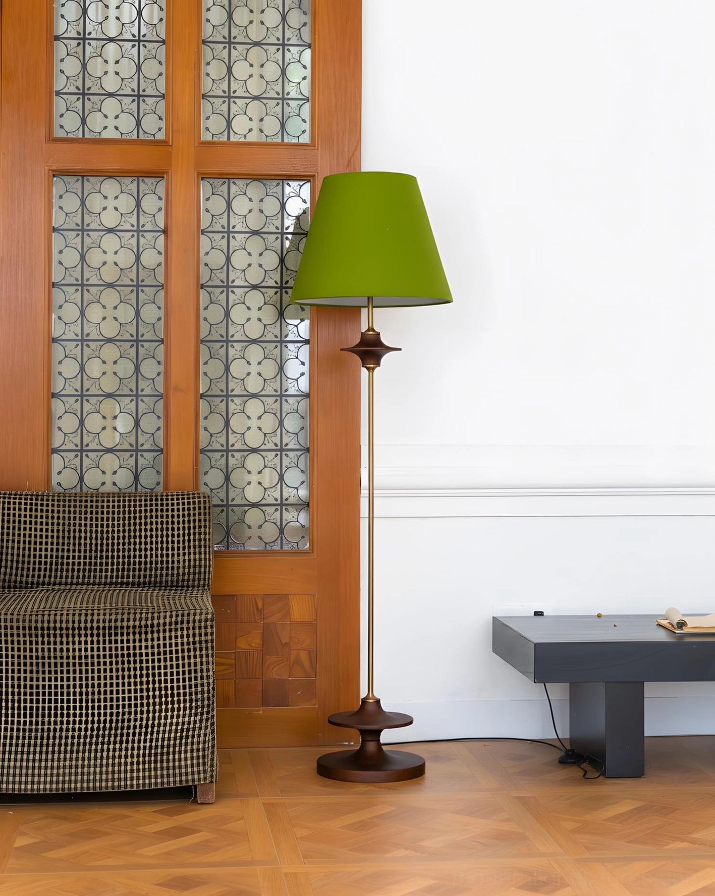 Terrava mid-century inspired floor lamp providing warm ambient lighting in sophisticated interior