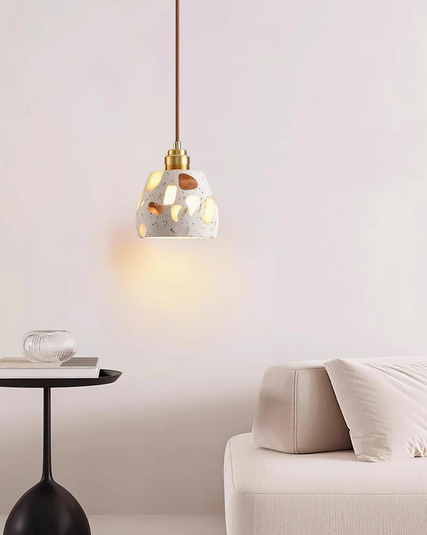 Terrazzo pendant light fixture demonstrating artisanal craftsmanship and natural stone patterns