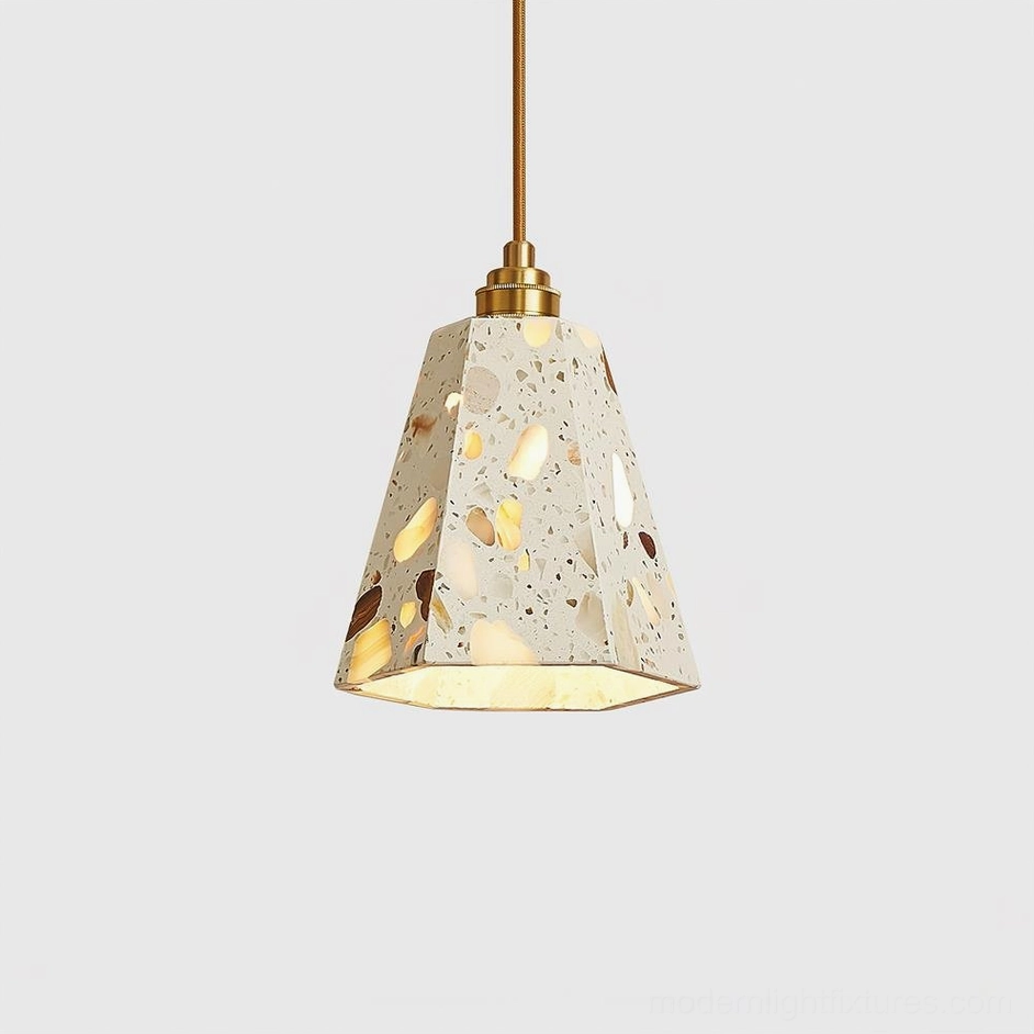 Large statement terrazzo pendant light Model B above dining table centerpiece