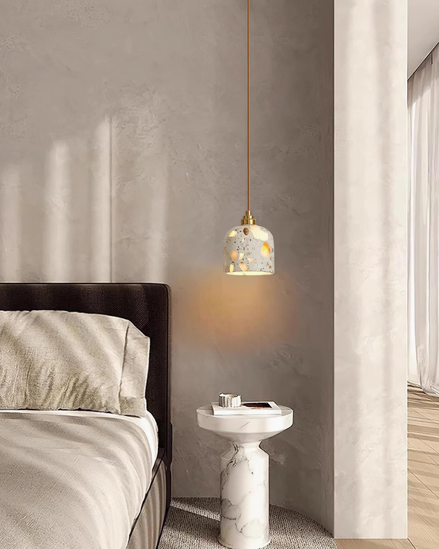 Modern mid-century terrazzo pendant light fixture close-up of natural stone aggregate
