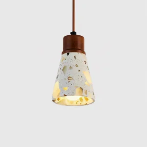 Single terrazzo pendant light with conical shade, brown wooden ceiling mount, and textured stone surface in studio lighting