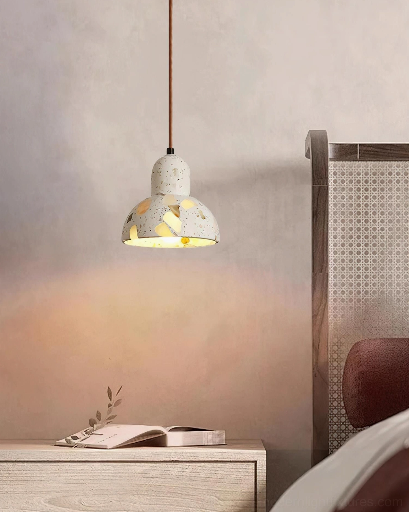 Contemporary terrazzo pendant light suspended in modern interior design setting