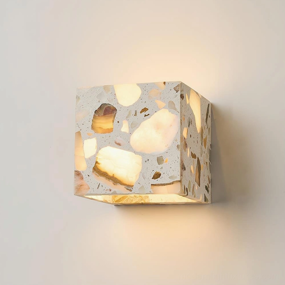 Square terrazzo wall sconce 12cm x 12cm compact size overhead view displaying natural stone inlay pattern and warm white 3000K LED glow