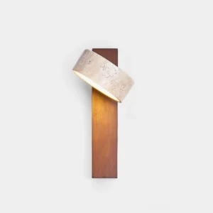 Tersus modern wall sconce with yellow travertine tilted shade and solid wood beam base, front studio view against white backdrop