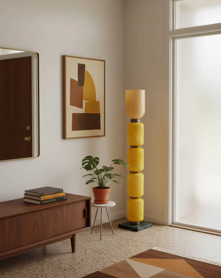 Tessara sculptural floor lamp in minimalist hallway with side table and potted plant, contemporary interior