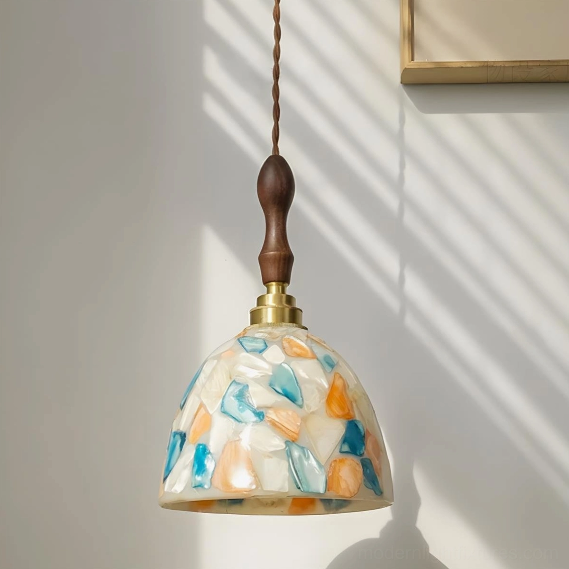 Tessaro artisan pendant light featuring hand-set glass mosaic and warm brass hardware detail