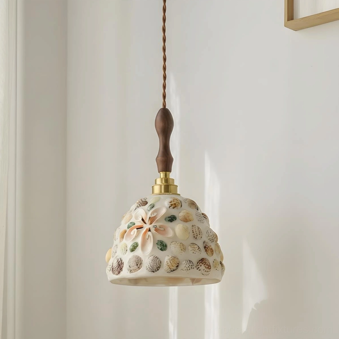 Tessaro glass pendant light showing warm wood and brass accents in mid-century modern style