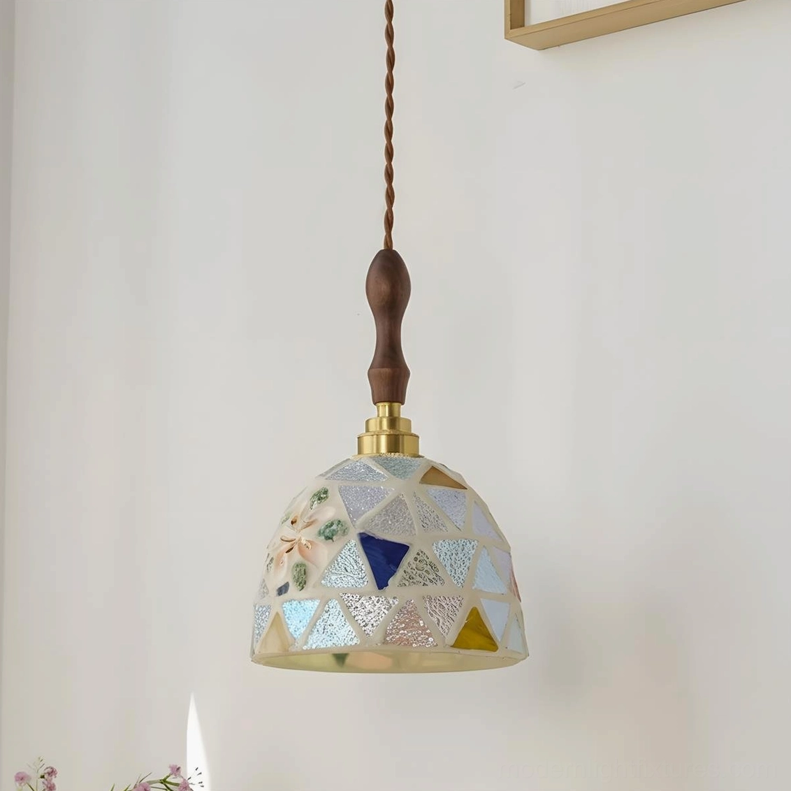 Tessaro mosaic pendant lamp in neutral tones diffusing soft inviting light through textured shade