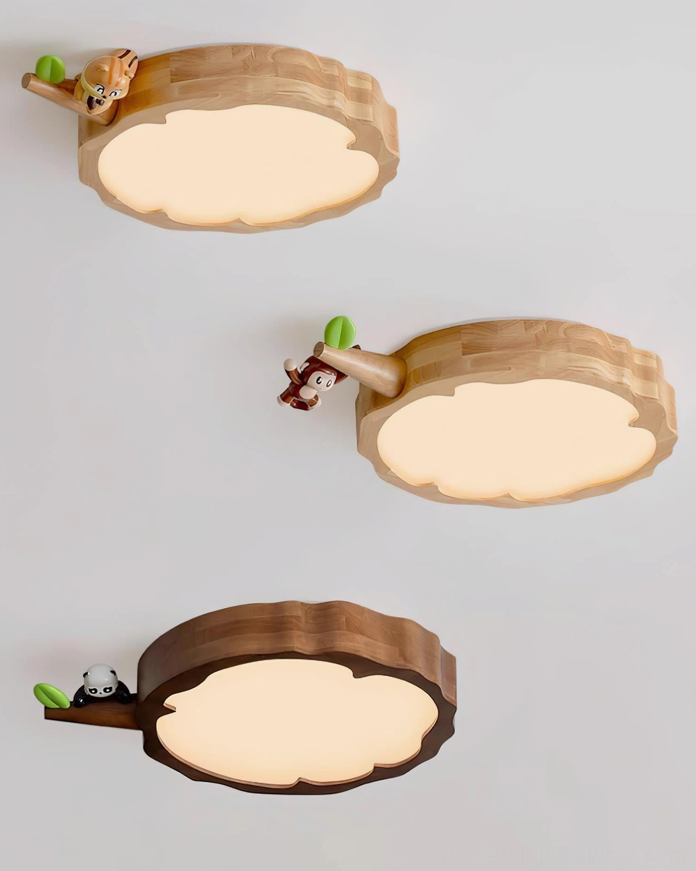 Comparison of three handcrafted animal ceiling light fixtures featuring squirrel, monkey, and panda designs