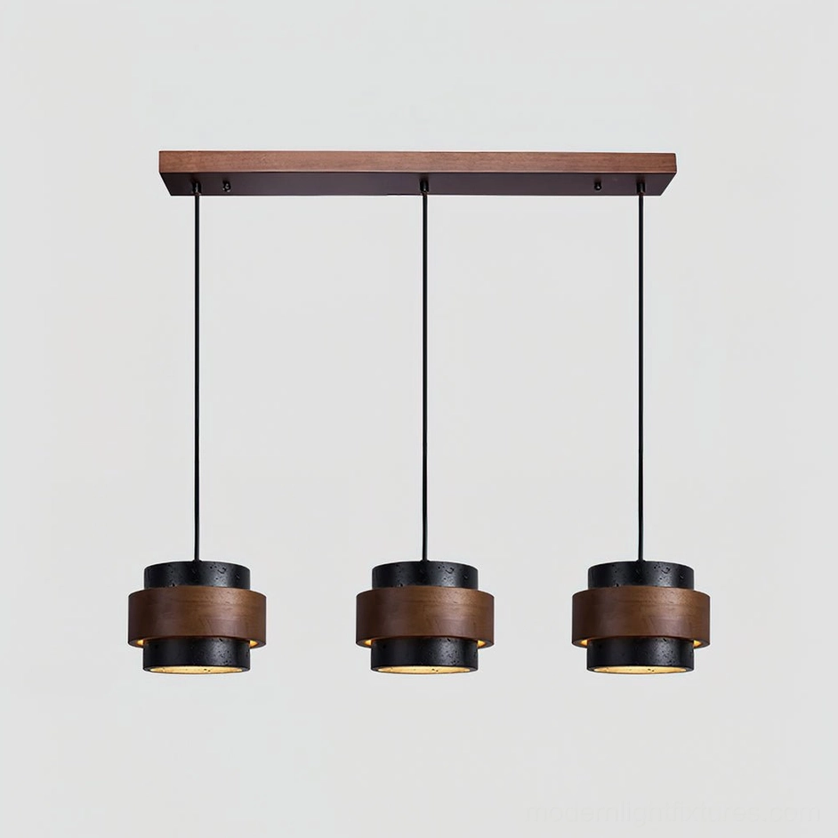 Three-head linear travertine pendant chandelier installation, architectural dining space lighting arrangement