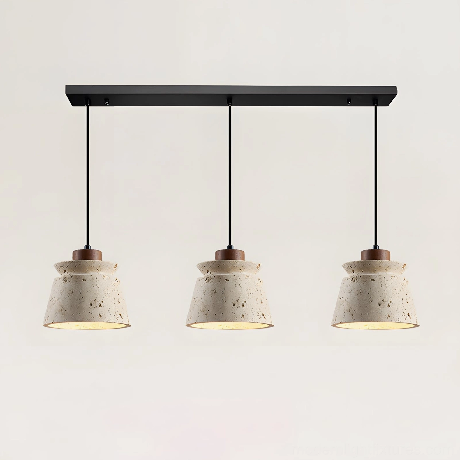 Three-head travertine pendant light configuration showing multiple walnut wood details and warm downward light distribution