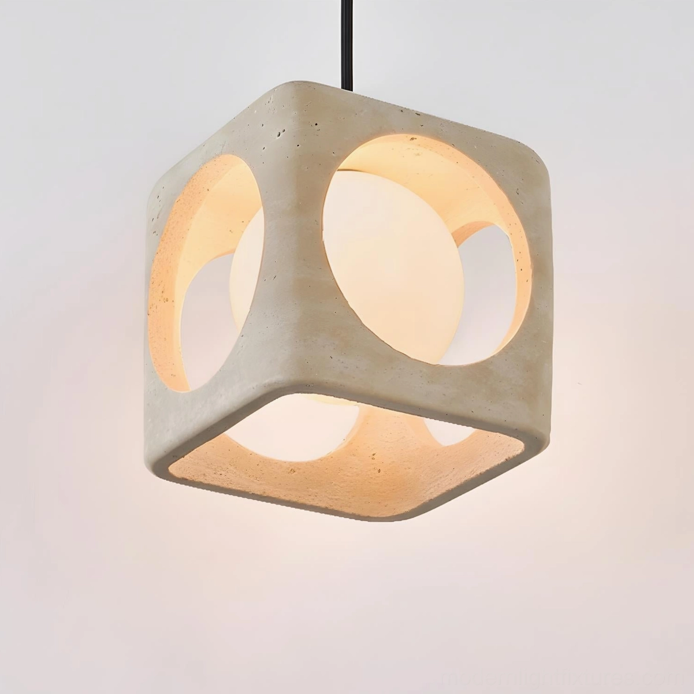 Three-head Hollowa travertine pendant light set creating sculptural statement in contemporary interior