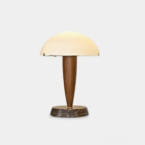 Tibby modern marble table lamp with walnut wood tapered stem and frosted glass dome shade on white studio background - front view