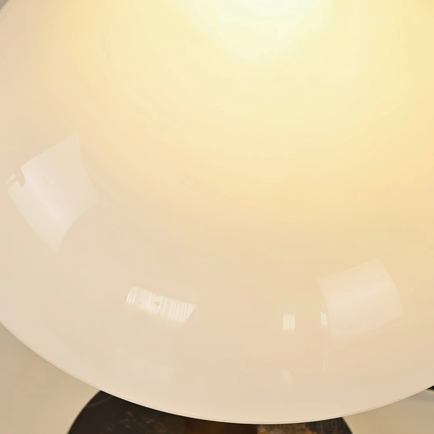 Tibby contemporary table lamp on wooden surface showing marble base and walnut wood construction in home interior setting