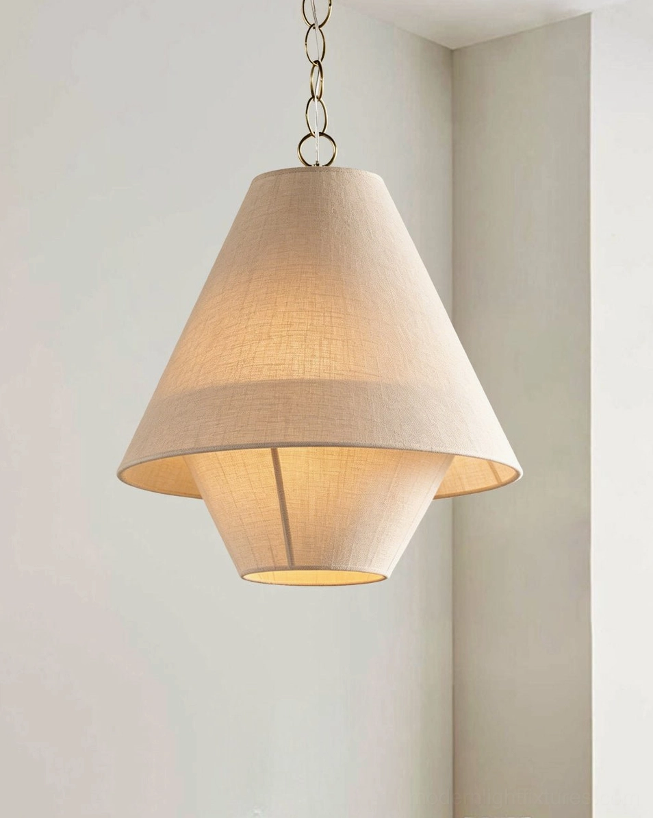 Tiera tiered linen cone pendant light detail shot showing double-layer fabric weave texture and brass metal frame construction