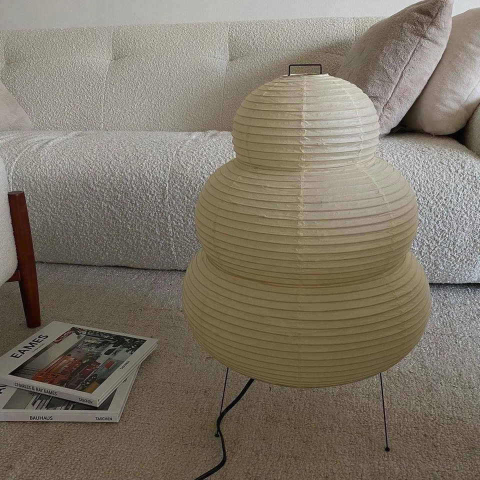 Tiered Shoji paper table lamp with warm ambiance, cozy home interior lighting atmosphere