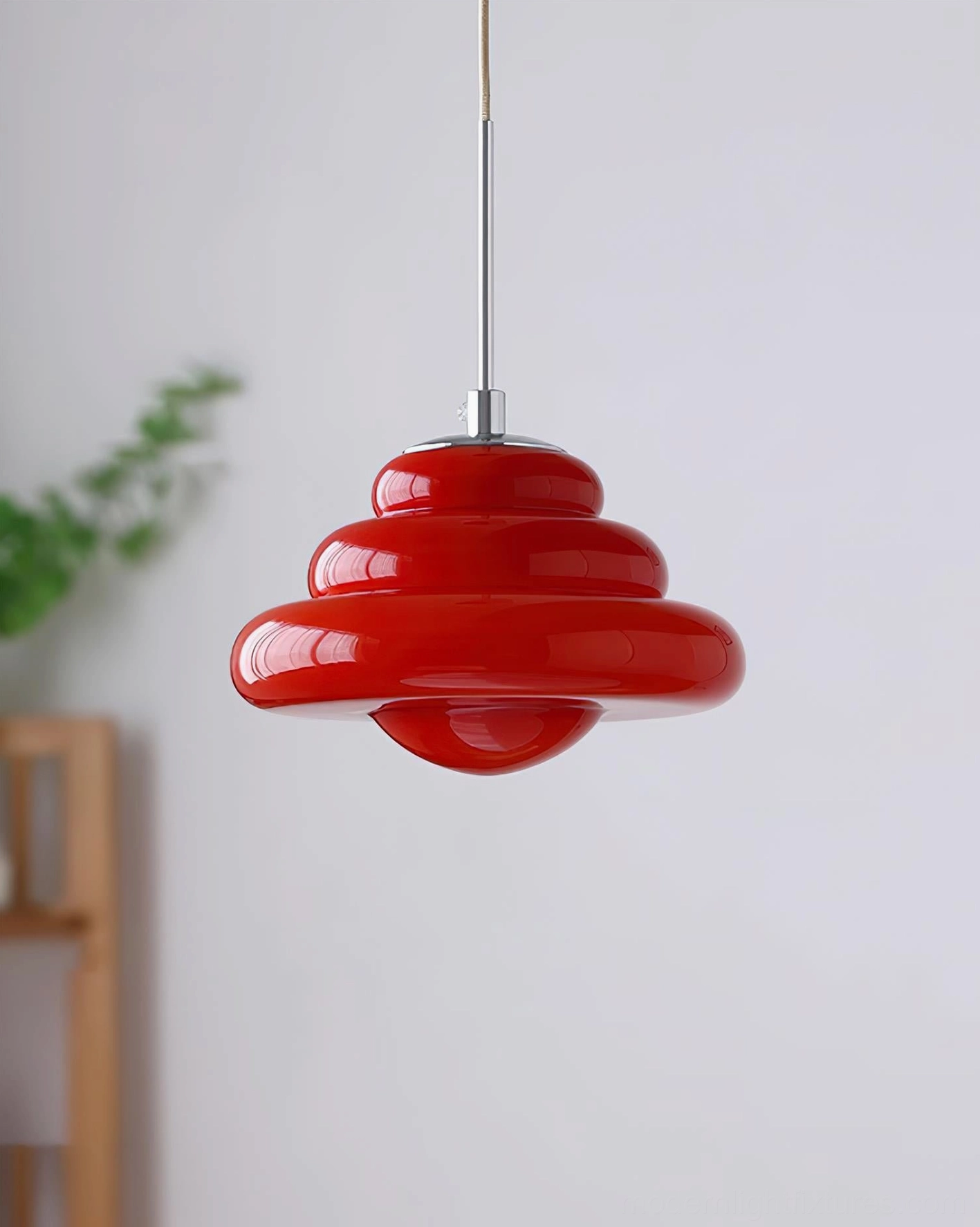 Tiered hanging lamp detail shot highlighting the layered glass shade architecture
