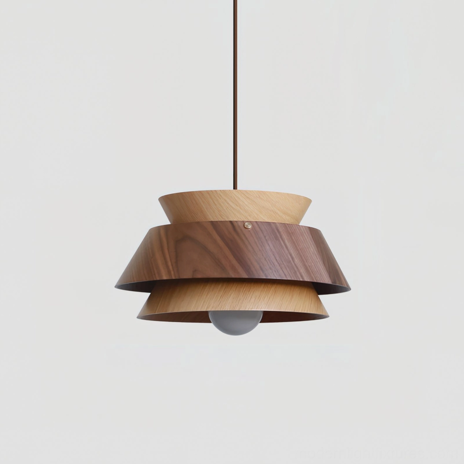 Tiered wood pendant light Model D installed in stylish contemporary interior with warm color temperature