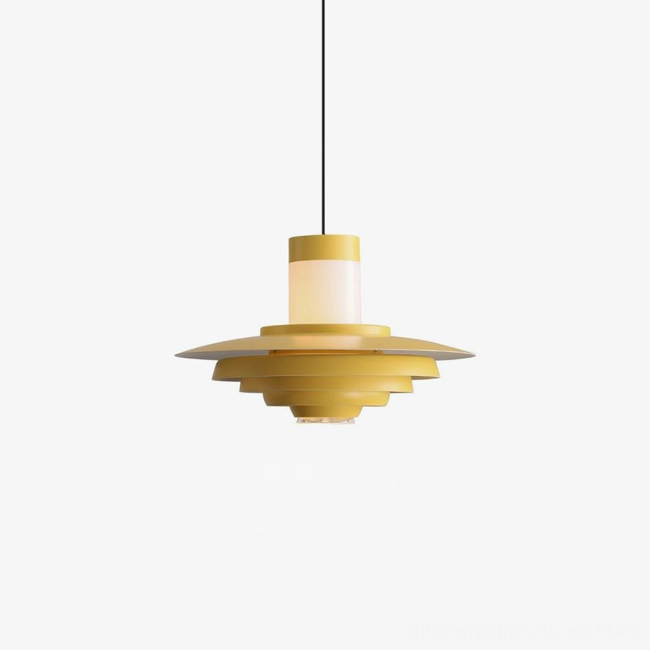 Tiered pendant lamp in vibrant yellow with stacked disc construction displayed in styled interior setting demonstrating color and sculptural form