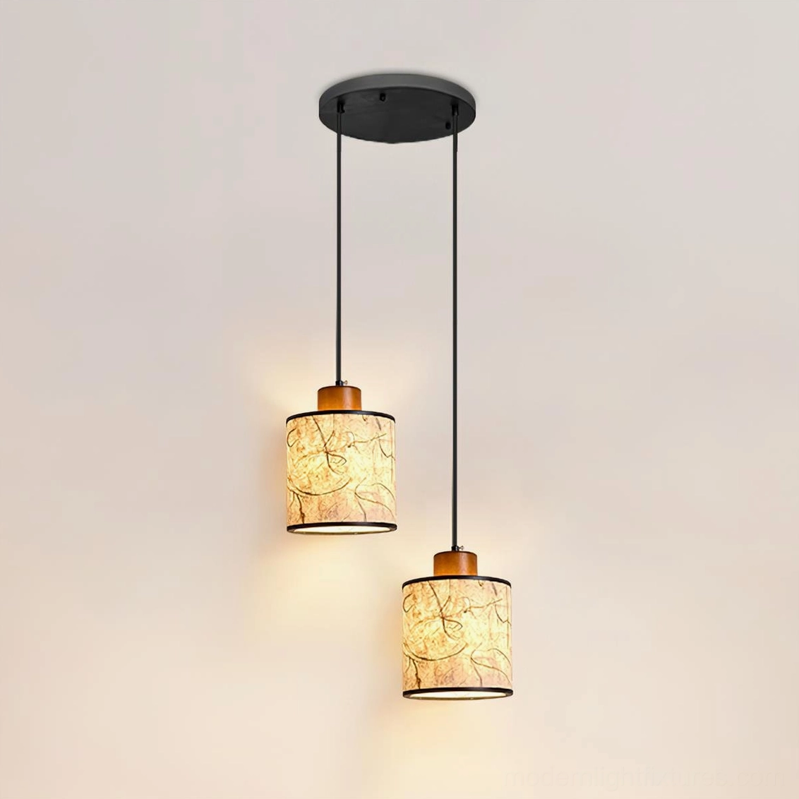 Two-head Tierra pendant light cluster configuration in compact dining or kitchen space with warm illumination