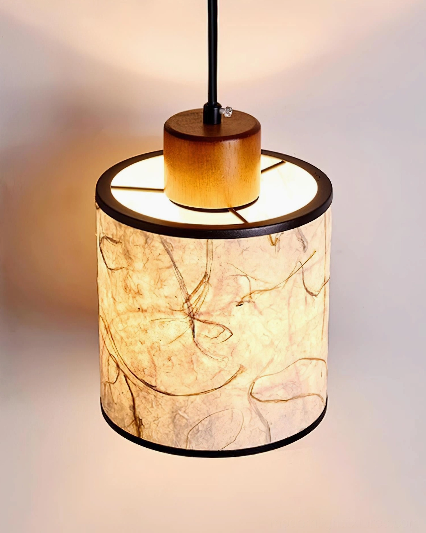 Tierra pendant lamp in interior setting demonstrating ambient lighting effect and design integration