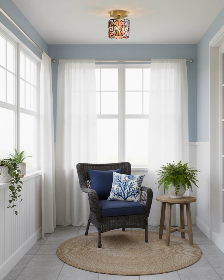 Reading nook with Tiffany stained glass ceiling light creating atmospheric colored lighting over sitting area