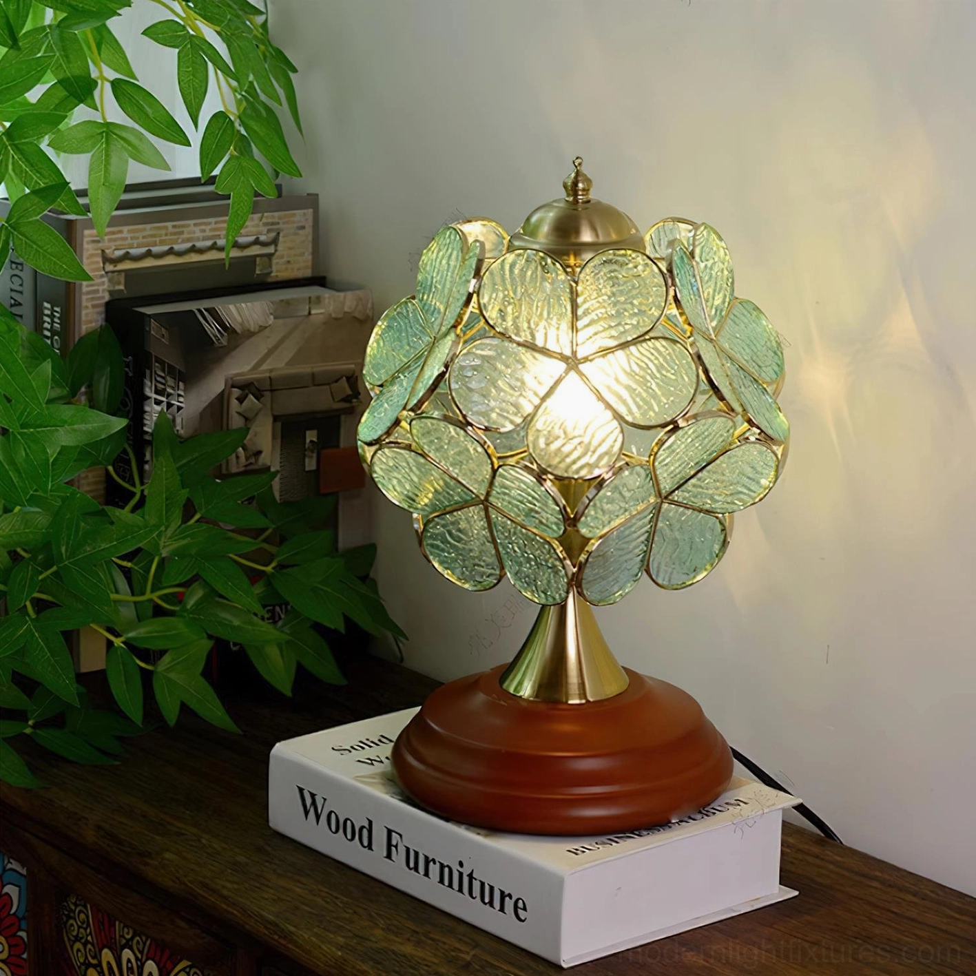 Tiffany stained glass table lamp with petal design shade creating soft diffused ambient lighting