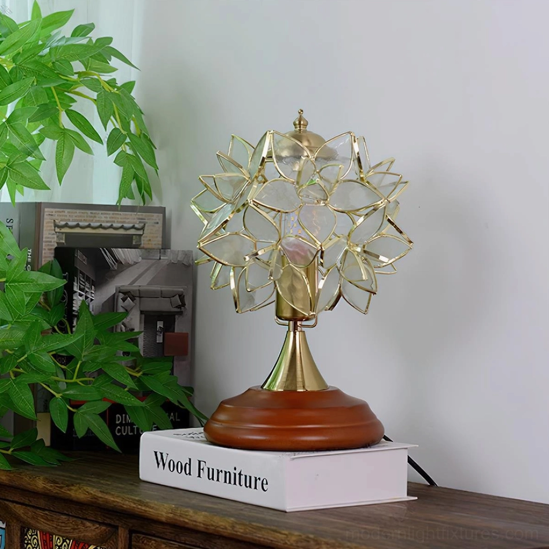 Tiffany table lamp illuminated showing warm light diffusion through colored stained glass shade