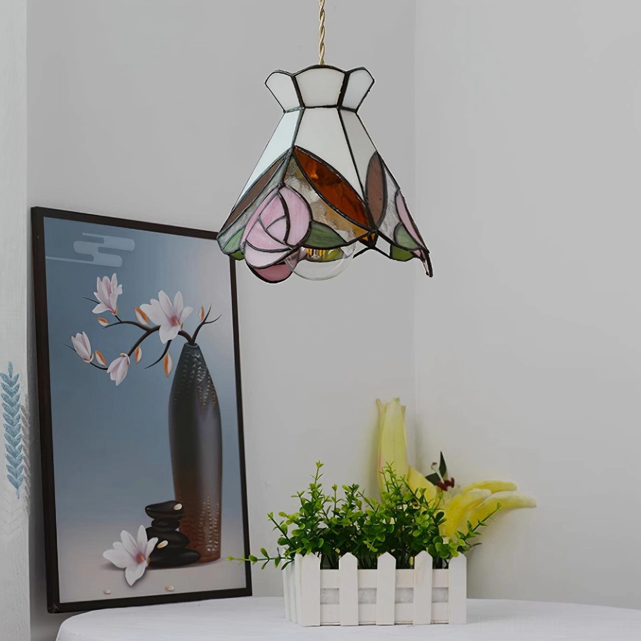 Tiffany rose pendant lamp highlighting Arts and Crafts design heritage with stained glass artistry