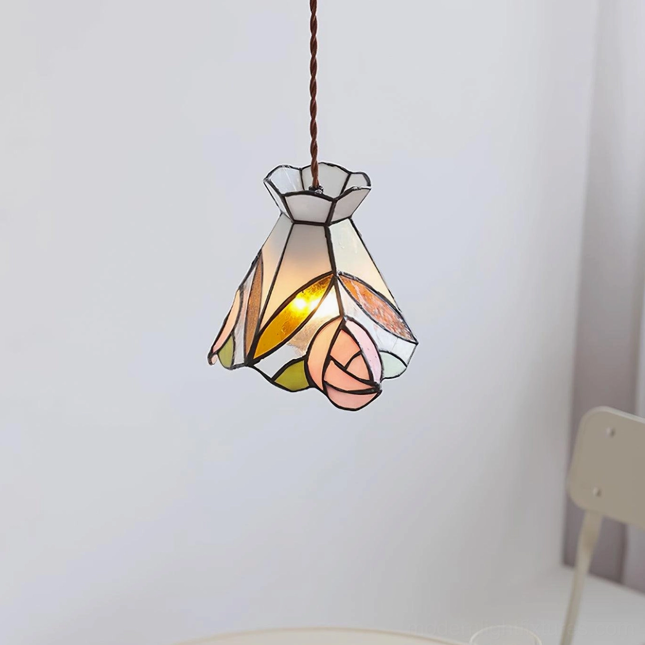 Tiffany rose pendant light in transitional home interior with vintage charm and modern elements
