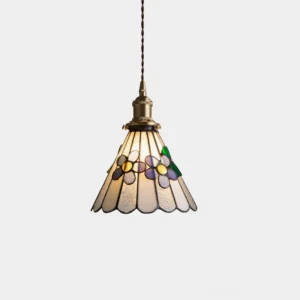Handcrafted Tiffany style stained glass pendant lamp with floral patterns and brass hardware, front view on white background