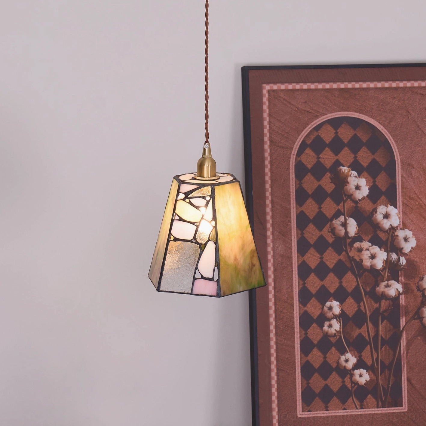 Handcrafted stained glass pendant light with trapezoid silhouette and vintage Tiffany style inspiration