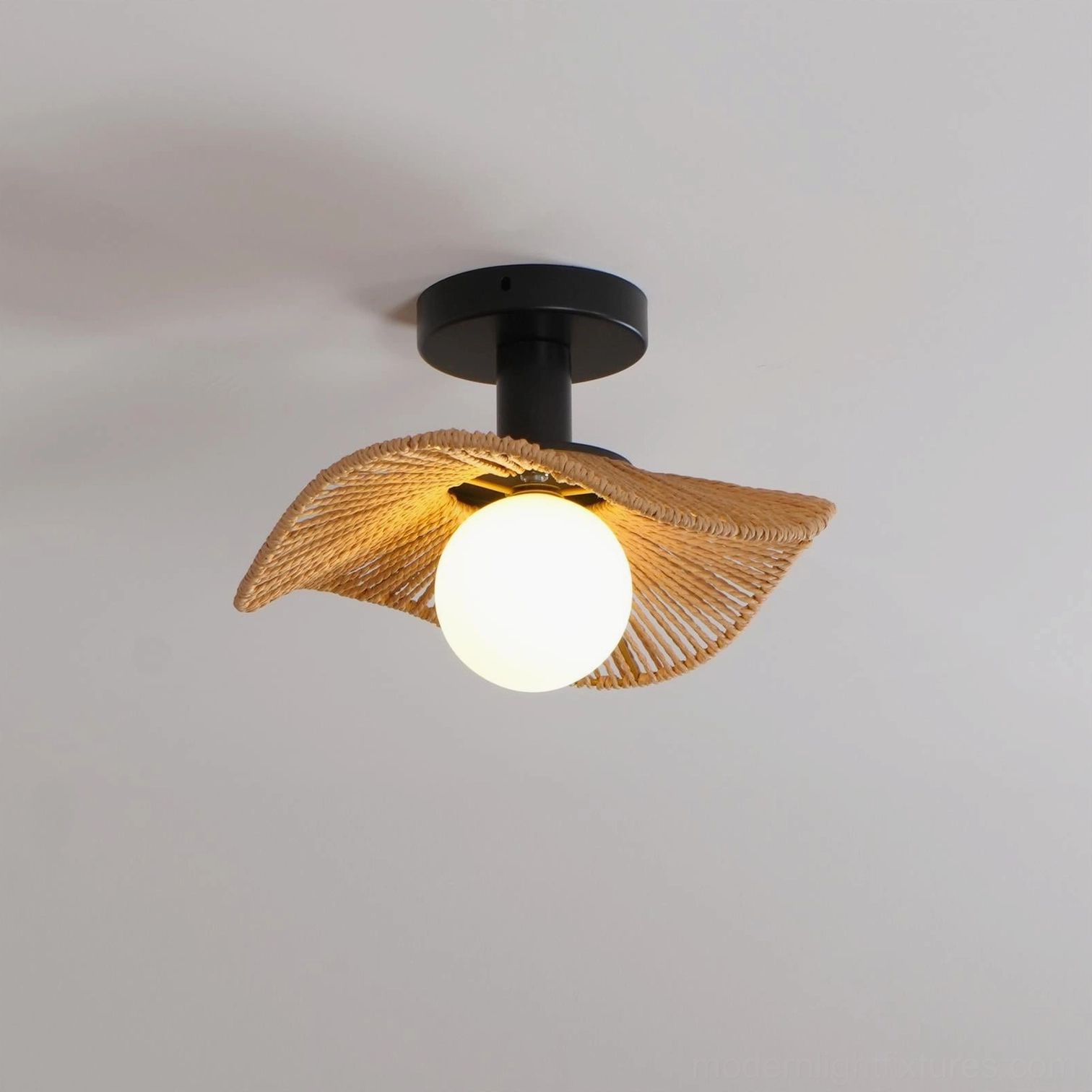 Tilda hemp rope and rattan ceiling light providing warm bistro-inspired ambiance for dining areas