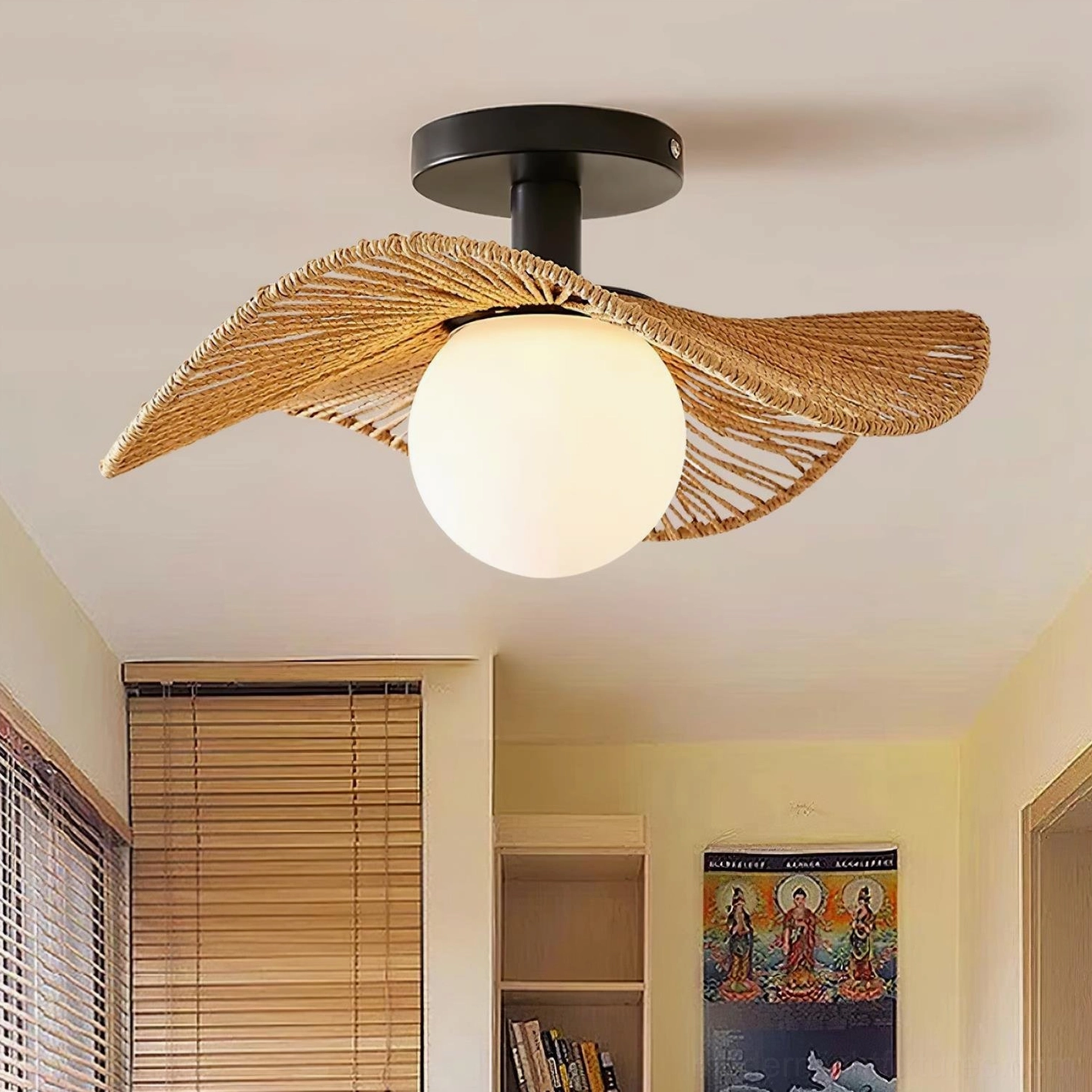 Tilda woven rattan ceiling light in Japanese-inspired space with bamboo blinds, leaf-shaped shade with black metal ceiling base