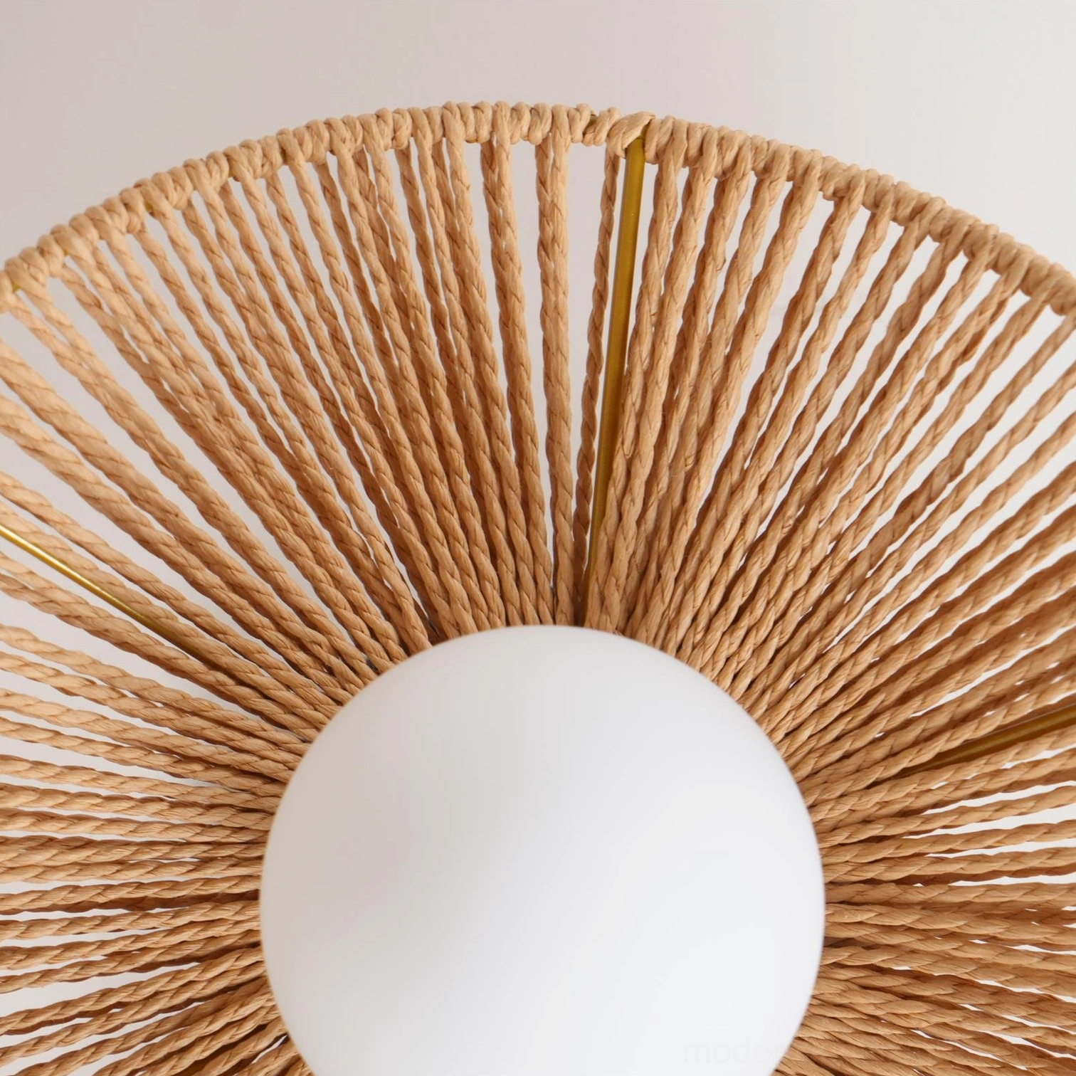 Tilda woven rattan ceiling light creating ambient shadow pattern effect on room ceiling and walls