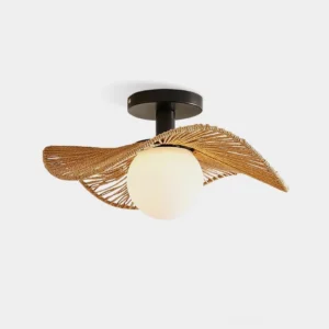 Tilda rattan ceiling light with woven leaf-shaped shade and frosted white glass diffuser, black metal ceiling mount, front studio view